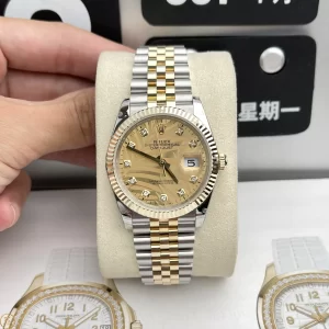 Đồng Hồ Rolex Siêu Cấp Datejust 126233 Mặt Lá Cọ Nhiệt Đới Vàng Champane Cọc Số Dạ Quang