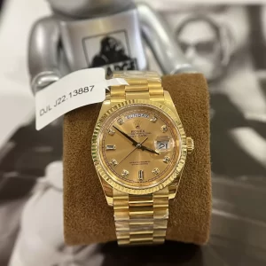 Đồng Hồ Rolex Super Fake 1:1 Day-Date 36 128238 Mặt Số Vàng Champagne Cọc Số Nạm Kim Cương